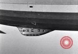 Image USS Akron avec plusieurs Consolidated N2Y-1 les avions en vol New Jersey United States USA, 1932, de la seconde 45 séquences d'archives historiques vidéo 65675031711