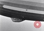 Image USS Akron avec plusieurs Consolidated N2Y-1 les avions en vol New Jersey United States USA, 1932, de la seconde 48 séquences d'archives historiques vidéo 65675031711