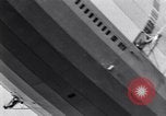 Image USS Akron avec plusieurs Consolidated N2Y-1 les avions en vol New Jersey United States USA, 1932, de la seconde 56 séquences d'archives historiques vidéo 65675031711