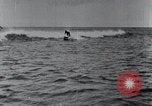 Image of surfboards United States USA, 1920, second 57 stock footage video 65675031733