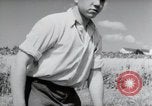 Image of German farmers harvesting oats Wiesbaden Germany, 1954, second 15 stock footage video 65675031781