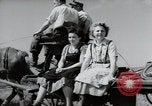 Image of German farmers harvesting oats Wiesbaden Germany, 1954, second 48 stock footage video 65675031781