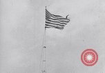 Image Drapeau américain dans le vent très rigide Dearborn Michigan USA, 1941, de la seconde 6 séquences d'archives historiques vidéo 65675031865