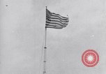 Image Drapeau américain dans le vent très rigide Dearborn Michigan USA, 1941, de la seconde 7 séquences d'archives historiques vidéo 65675031865