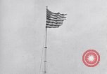 Image Drapeau américain dans le vent très rigide Dearborn Michigan USA, 1941, de la seconde 8 séquences d'archives historiques vidéo 65675031865