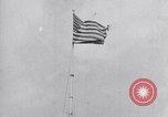 Image Drapeau américain dans le vent très rigide Dearborn Michigan USA, 1941, de la seconde 11 séquences d'archives historiques vidéo 65675031865