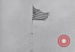Image Drapeau américain dans le vent très rigide Dearborn Michigan USA, 1941, de la seconde 17 séquences d'archives historiques vidéo 65675031865