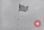 Image Drapeau américain dans le vent très rigide Dearborn Michigan USA, 1941, de la seconde 21 séquences d'archives historiques vidéo 65675031865