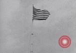 Image Drapeau américain dans le vent très rigide Dearborn Michigan USA, 1941, de la seconde 22 séquences d'archives historiques vidéo 65675031865