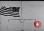 Image Drapeau américain dans le vent très rigide Dearborn Michigan USA, 1941, de la seconde 27 séquences d'archives historiques vidéo 65675031865