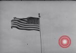 Image Drapeau américain dans le vent très rigide Dearborn Michigan USA, 1941, de la seconde 29 séquences d'archives historiques vidéo 65675031865