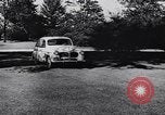 Image of Michigan manufacturer displays new automobile Michigan United States USA, 1941, second 22 stock footage video 65675031875