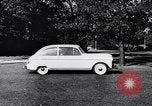Image of Michigan manufacturer displays new automobile Michigan United States USA, 1941, second 53 stock footage video 65675031875