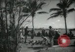 Image of tourists in Miami Beach Miami Florida USA, 1936, second 4 stock footage video 65675031892