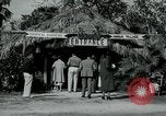 Image of tourists at Seminole Native American Indian trading post Miami Florida USA, 1936, second 6 stock footage video 65675031908