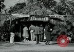 Image of tourists at Seminole Native American Indian trading post Miami Florida USA, 1936, second 7 stock footage video 65675031908