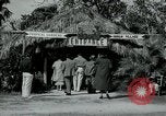 Image of tourists at Seminole Native American Indian trading post Miami Florida USA, 1936, second 9 stock footage video 65675031908