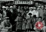 Image of tourists at Seminole Native American Indian trading post Miami Florida USA, 1936, second 22 stock footage video 65675031908