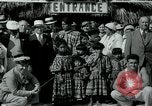Image of tourists at Seminole Native American Indian trading post Miami Florida USA, 1936, second 24 stock footage video 65675031908