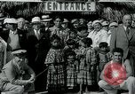 Image of tourists at Seminole Native American Indian trading post Miami Florida USA, 1936, second 27 stock footage video 65675031908