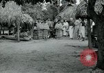 Image of tourists at Seminole Native American Indian trading post Miami Florida USA, 1936, second 29 stock footage video 65675031908