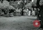 Image of tourists at Seminole Native American Indian trading post Miami Florida USA, 1936, second 30 stock footage video 65675031908