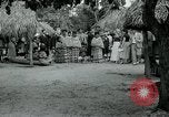 Image of tourists at Seminole Native American Indian trading post Miami Florida USA, 1936, second 31 stock footage video 65675031908