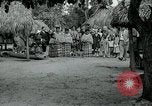 Image of tourists at Seminole Native American Indian trading post Miami Florida USA, 1936, second 32 stock footage video 65675031908