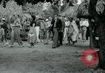 Image of tourists at Seminole Native American Indian trading post Miami Florida USA, 1936, second 40 stock footage video 65675031908