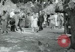 Image of tourists at Seminole Native American Indian trading post Miami Florida USA, 1936, second 49 stock footage video 65675031908