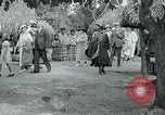 Image of tourists at Seminole Native American Indian trading post Miami Florida USA, 1936, second 52 stock footage video 65675031908