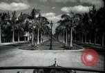 Image of car on a road Miami Florida USA, 1936, second 12 stock footage video 65675031913