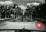 Image of car on a road Miami Florida USA, 1936, second 13 stock footage video 65675031913