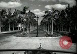Image of car on a road Miami Florida USA, 1936, second 15 stock footage video 65675031913