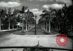 Image of car on a road Miami Florida USA, 1936, second 16 stock footage video 65675031913