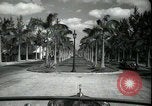 Image of car on a road Miami Florida USA, 1936, second 20 stock footage video 65675031913