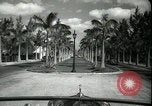 Image of car on a road Miami Florida USA, 1936, second 22 stock footage video 65675031913