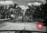 Image of car on a road Miami Florida USA, 1936, second 23 stock footage video 65675031913