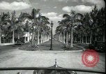 Image of car on a road Miami Florida USA, 1936, second 24 stock footage video 65675031913