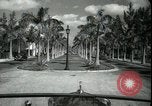Image of car on a road Miami Florida USA, 1936, second 26 stock footage video 65675031913