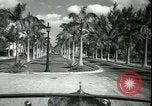 Image of car on a road Miami Florida USA, 1936, second 27 stock footage video 65675031913