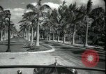 Image of car on a road Miami Florida USA, 1936, second 28 stock footage video 65675031913