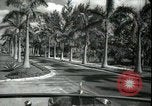 Image of car on a road Miami Florida USA, 1936, second 29 stock footage video 65675031913