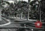 Image of car on a road Miami Florida USA, 1936, second 30 stock footage video 65675031913