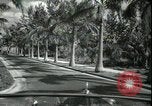 Image of car on a road Miami Florida USA, 1936, second 31 stock footage video 65675031913