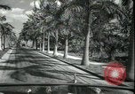 Image of car on a road Miami Florida USA, 1936, second 33 stock footage video 65675031913