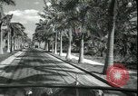 Image of car on a road Miami Florida USA, 1936, second 34 stock footage video 65675031913