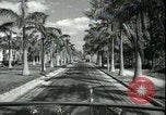 Image of car on a road Miami Florida USA, 1936, second 36 stock footage video 65675031913
