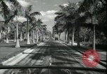 Image of car on a road Miami Florida USA, 1936, second 40 stock footage video 65675031913