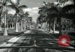 Image of car on a road Miami Florida USA, 1936, second 41 stock footage video 65675031913